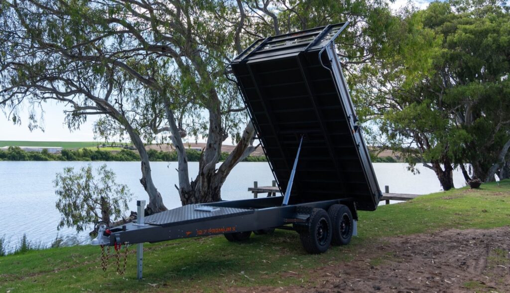 premium x gen 2 flat top trailer in the field - trailer warranty - rivercity trailers
